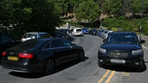 Getty Images cars parked on double yellow lines near Bournemouth beach in June 2020
