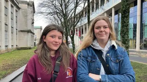 Students Gabriella Coviell (right) and Catherine Harris (left) pictured outside Cardiff University. 