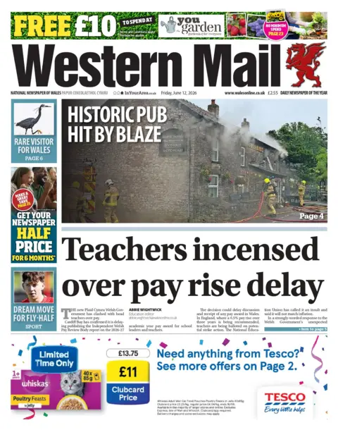 Western Mail The front page of Western Mail. The main headline reads: Teachers incensed over pay rise delay. Above is a picture of a building on fire with firefighters working hard to extinguish it, the headline accompanying it reads "historic pub hit by blaze".