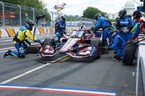 Getty Images Pit crews with Felix Rosenqvist, driver of the #60 Meyer Shank w/Curb-Agajanian Honda, in pit row of the NTT INDYCAR Series on August 23, 2026 in Washington, DC.