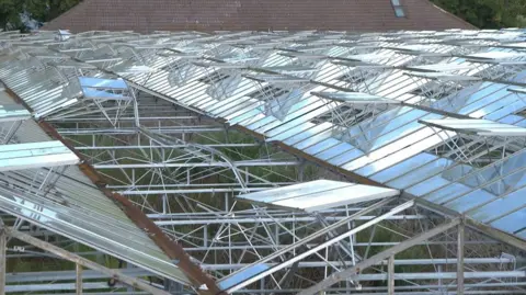An aerial view of a redundant glasshouse site in St Clement.