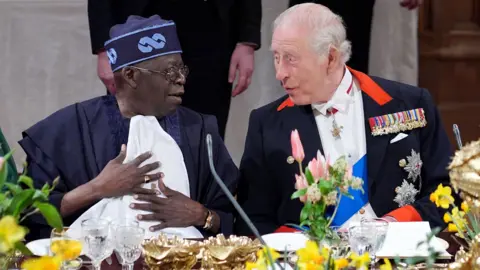 President of Nigeria Bola Ahmed Tinubu and King Charles III during a state banquet at Windsor Castle, Berkshire, on day one of their state visit to the UK on 18 March 2026.