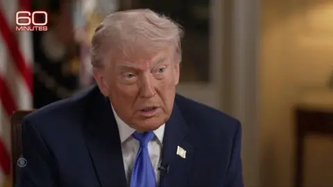 US President Donald Trump wears a blue tie.