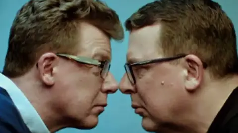 Twins Craig and Charlie Reed remake infamous album cover where they look at each other face on