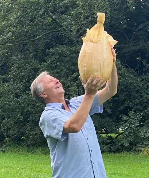 Wendy Griffin Gareth Griffin with his giant onion