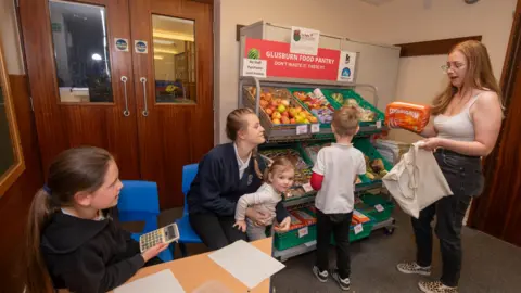 North Yorkshire Council group of children and a display of food