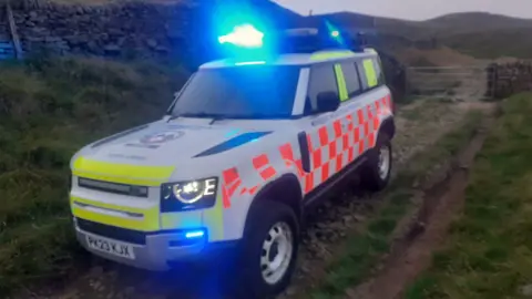 An image of a Kinder Mountain Rescue vehicle on a hill in the Peak District