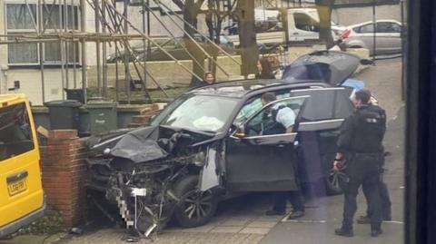 Crashed vehicle in the aftermath of Streatham attack