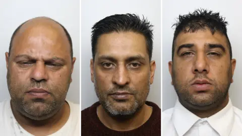 West Yorkshire Police Headshots of three men in their 40s and 50s. All three have stubble. The one on the left has a shaved head, the middle man has dark hair and the one on the right has dark hair. 