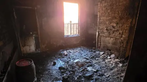 Leicestershire Fire and Rescue Service Inside of a house in Lancaster Street, Leicester, that was damaged by a fire. The blaze has destroyed all of the families belongings.