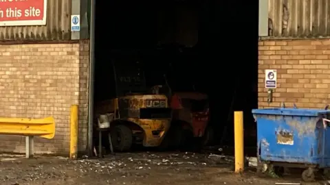 Luke Deal/BBC A paper recycling warehouse showing fire damage