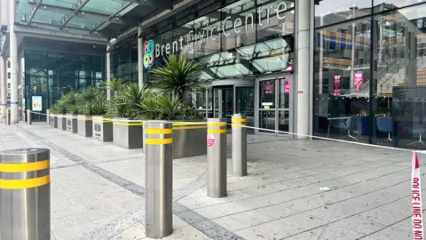 A police cordon is in place outside Brent Civic Centre. 