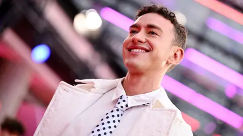 Getty Images Olly Alexander participa do "Elton John: Nunca é tarde demais" Gala principal durante o 68º BFI London Film Festival no Royal Festival Hall em 10 de outubro de 2024 em Londres, Inglaterra