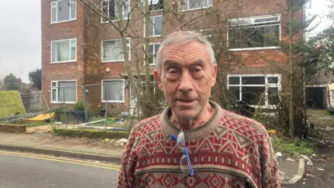 Photograph of David Adams, a landlord who owns dozens of flats on Baguley Crescent.