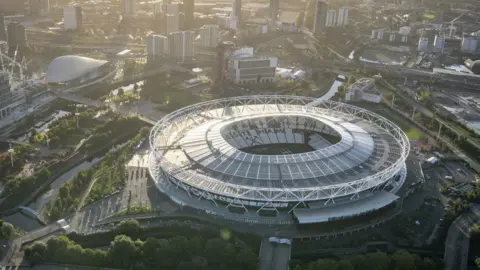 London Legacy Development Corporation A CGI concept image of the London Stadium once the solar membrane is complete. It shows the stadium from high above with part of the Stratford skyline in view