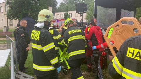 Seven emergency services personnel at the scene helping people struck by lightning