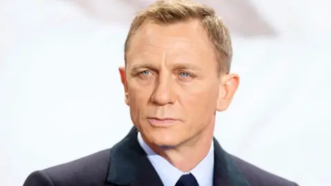 Getty Images Daniel Craig pictured wearing a tuxedo at a film premiere