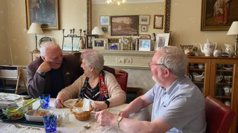 Valerii with Brenda and Brian Dinsdale