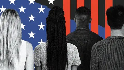 The backs of four people, appearing in front of elements of a US flag