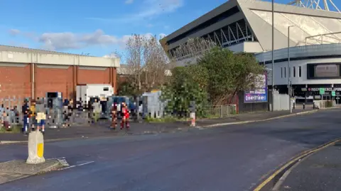 The view from outside the building with Ashton Gate Stadium in the distance