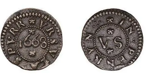 A picture of two sides of a coin. The image of the left has writing around the edge of the coin face with 1668 in the middle. The coin on the right also has writing around the edge and in the middle it reads VS.