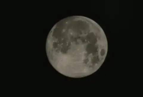 Cazbar/Weather Watchers A huge moon is pictured in the night sky