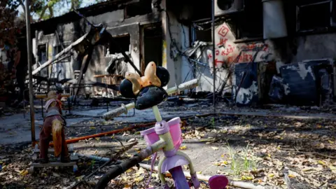 Reuters A child's bicycle is seen at Kibbutz Nir Oz, southern Israel, after a deadly attack by Hamas-led gunmen (October 30, 2023)