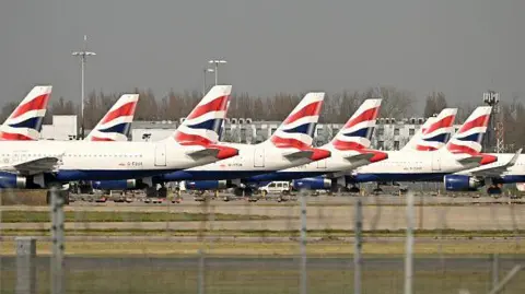 Passenger aircraft operated by British Airways on the tarmac at London Heathrow Airport
