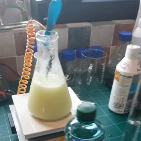 Hertfordshire Police Chemicals in glass containers and bottles on a desk