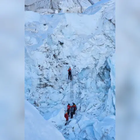 Nepal Department of Tourism Nepali mountaineers have cleared a route past a huge chunk of ice on Mount Everest