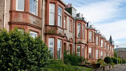 Getty Images A row of tenement houses 