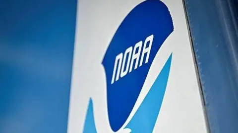 Logo of the NOAA at the Kennedy Space Centre