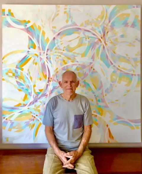 Hume family Tom Hume with one of his artworks