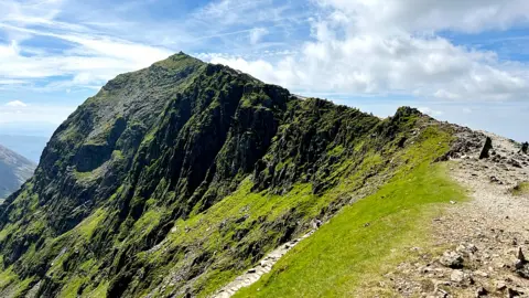 Getty Images The summit of Snowdon on a sunny day 