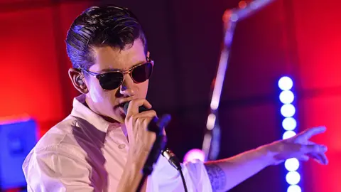 Arctic Monkey Alex Turner is performing in 2013