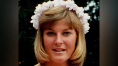 Handout A cropped, close-up photo of Helen as a young woman, with blonde, shoulder-length hair and a crown of flowers