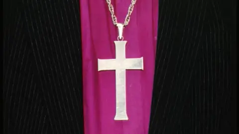 BBC Religious cross and clothing of Church of England Bishop