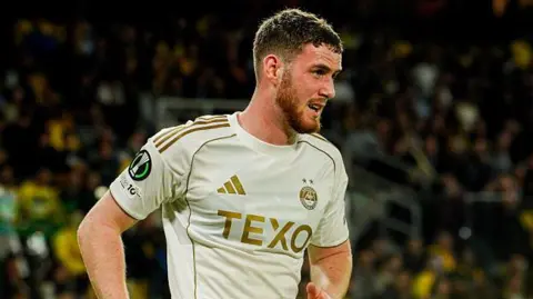 Tottenham Hotspur defender Alfie Dorrington, pictured playing for Aberdeen on loan.