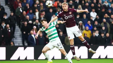 Harry Milne of Heart of Midlothian and Kieran Tierney of Celtic