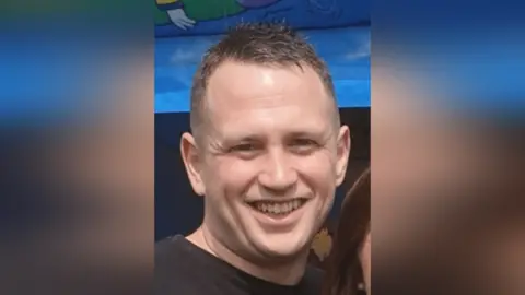 London Fire Brigade Anthony Knott in a black t-shirt. 