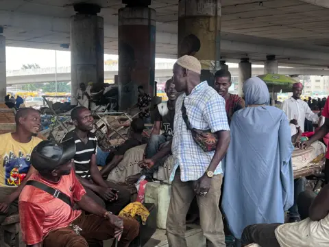 People under the bridge in Lagos