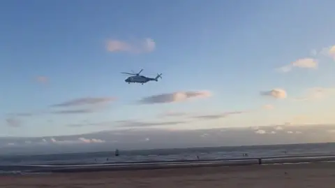 Liverpool Echo Helicopter over Mersey looking for missing teenager