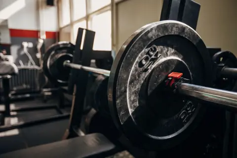 A stock image of barbells in a gym