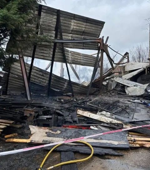 Nottinghamshire Fire and Rescue Service Image showing a section of a building at Parallax Equestrian and Plastics, in Gunthorpe, Nottinghamshire, damaged by fire.