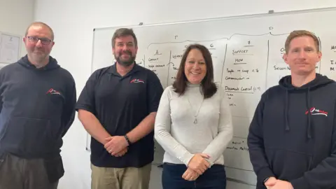 BBC Helen Barge and employees Alex Murphy, John Bassett and Phil Davies