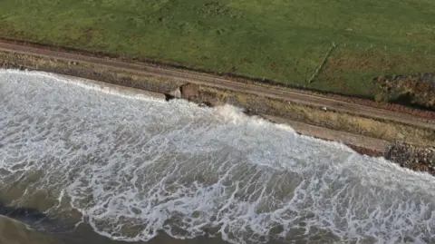 Damaged sea wall near Brora