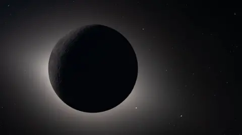 NASA In this handout image provided by NASA, Captured by the Artemis II crew during their lunar flyby on April 6, 2026, this image shows the Moon fully eclipsing the Sun.