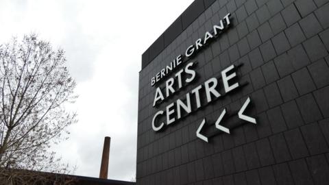 View of a sign showing the entrance to the Bernie Grant Arts Centre
