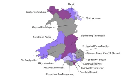 Map showing the Senedd election boundaries from 2026. Constituencies are labelled with their new Welsh names and colour-coded in grey and different shades of purple. 