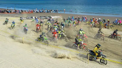 Getty Motocross bikes on Weymouth beach